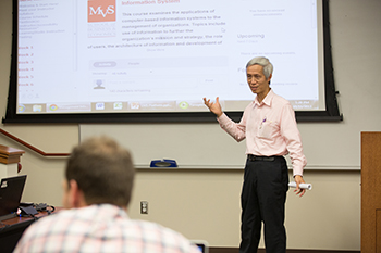 Professor Minder Chen leads faculty training workshops.