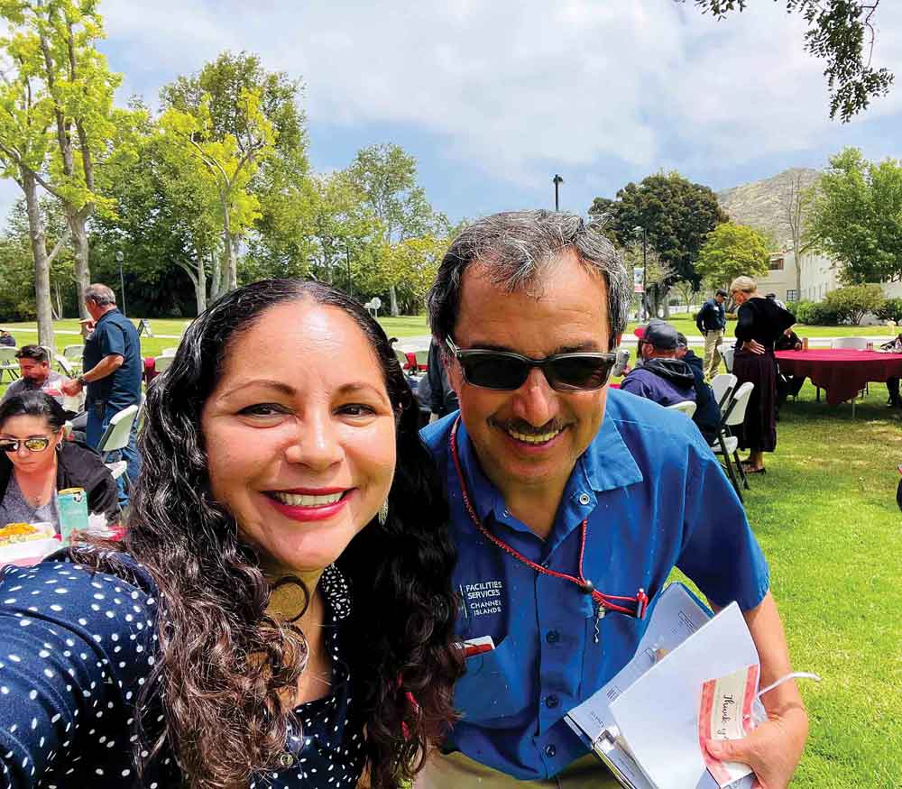 Associate Professor of English  Georgina Guzmán with Facilities Project Supervisor Rogelio Mendoza at Campus Workersʼ Day Luncheon.