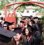 More than 450 students process through arch at Commencement