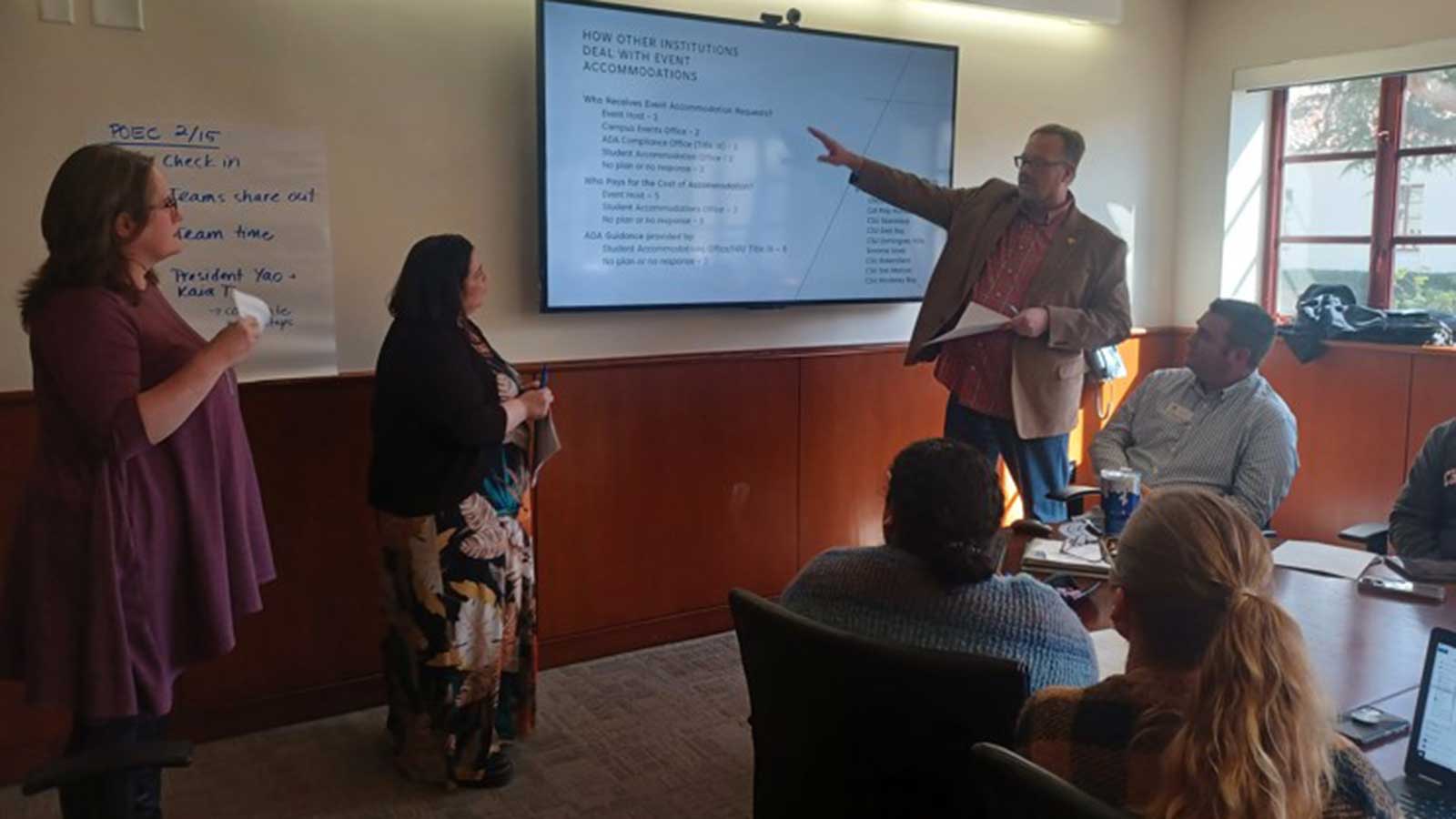 POEC cohort members presenting their findings.